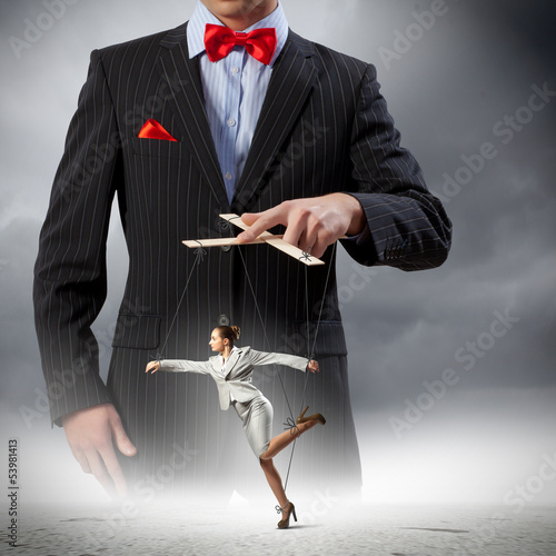Photo: Businessman puppeteer Businessman puppeteer