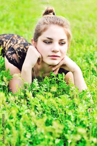 Photo: teen girl in grass teen girl in grass