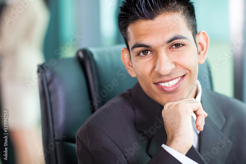 Photo: headshot of young Arabian businessman headshot of young Arabian businessman