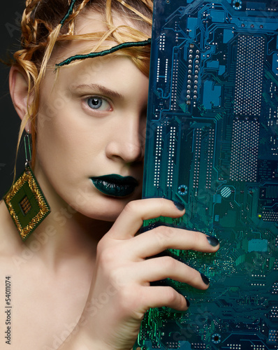 Photo: beautiful woman with motherboard beautiful woman with motherboard