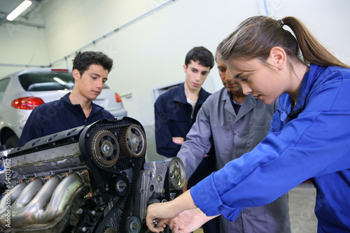 Photo: Mechanics training class with teacher and students Mechanics training class with teacher and students