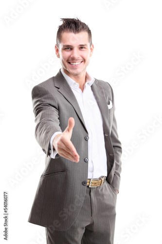 Photo: A business man with an open hand ready to seal a deal A business man with an open hand ready to seal a deal