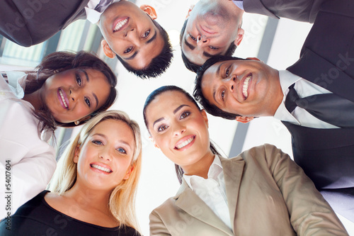 Photo: group of business people looking down group of business people looking down