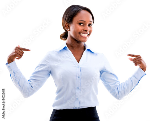 Photo: Business woman pointing at herself Business woman pointing at herself