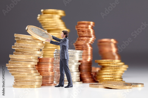 Photo: Business man saving money II Business man saving money II