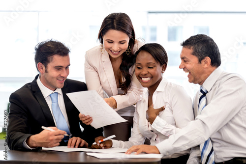 Photo: Business group working together Business group working together