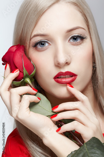 Photo: blonde woman with rose blonde woman with rose