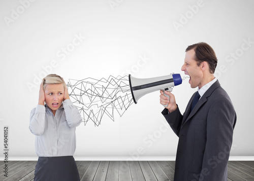 Photo: Businessman holding a megaphone Businessman holding a megaphone