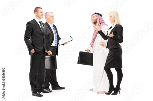 Photo: Businessmen and businesswoman having a conversation Businessmen and businesswoman having a conversation