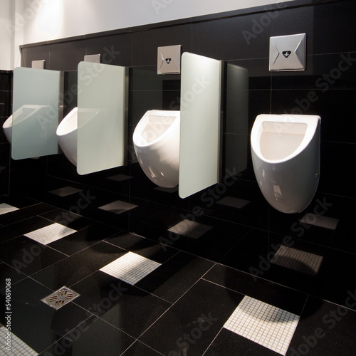 Photo: urinal man clean toilets urinal man clean toilets