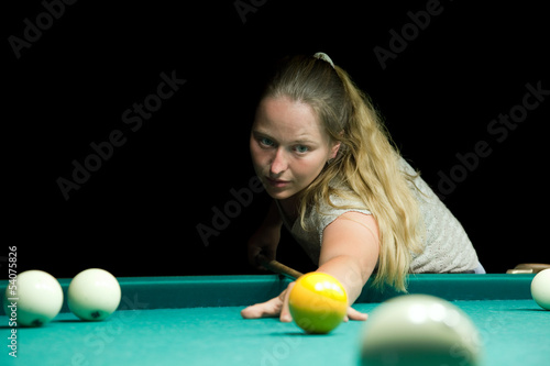 Photo: woman plays russian billiards woman plays russian billiards