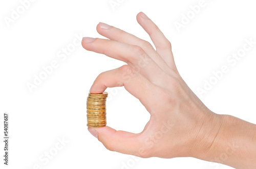 Photo: Golden coins and hand isolated on white background Golden coins and hand isolated on white background