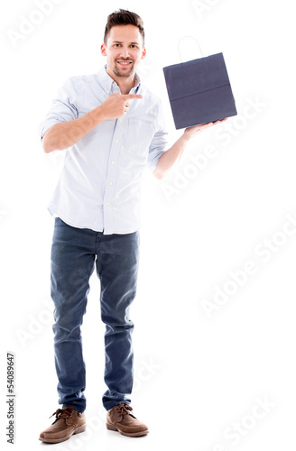 Photo: Man pointing at a shopping bag Man pointing at a shopping bag