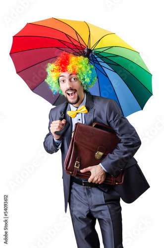 Photo: Clown businessman isolated on white Clown businessman isolated on white