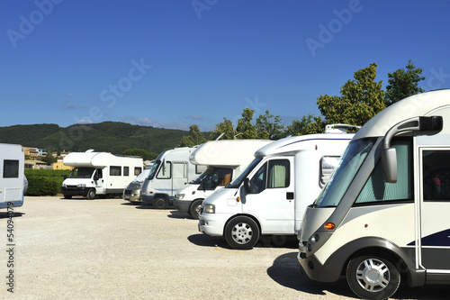 Photo: Campers at a camper site Campers at a camper site