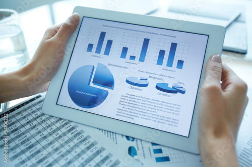 Photo: Holding electronic document Holding electronic document