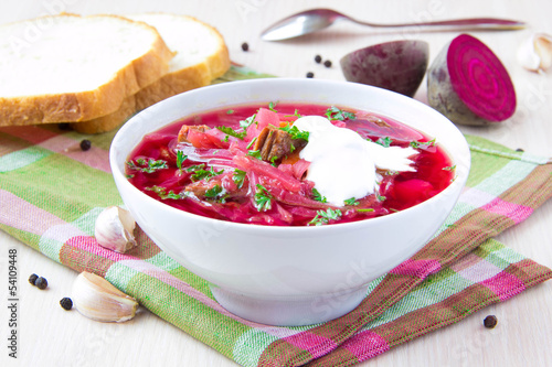 Photo: Traditional Russian borsch soup with beef, beet and sour cream Traditional Russian borsch soup with beef, beet and sour cream