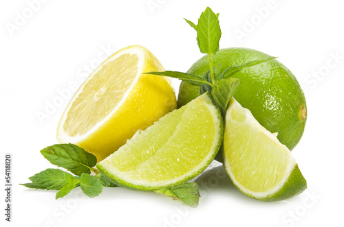 Photo: Lime,lemon and fresh leaves of mint on white Lime,lemon and fresh leaves of mint on white