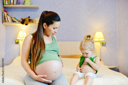 Photo: mother and her baby daughter mother and her baby daughter