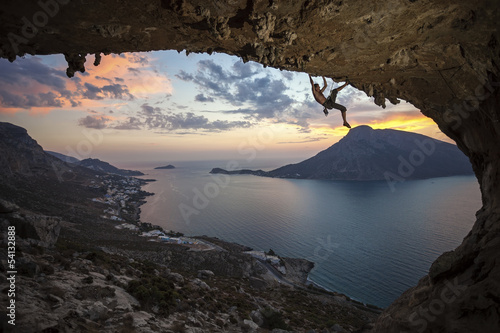  Male rock climber at sunset. Kalymnos Island, Greece