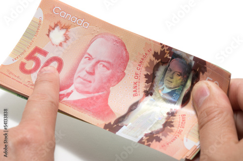 Photo: Finger pointing the 50 dollars Finger pointing the 50 dollars