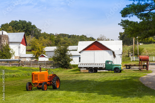 Photo: American Countryside Farm With Tractor American Countryside Farm With Tractor