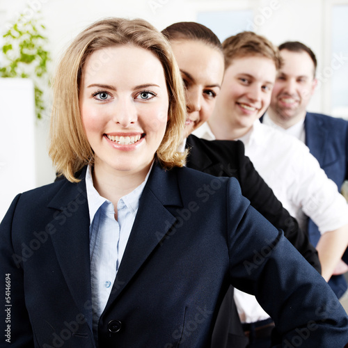 Photo: Successful business people are in line Successful business people are in line