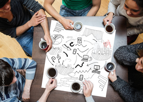 Photo: Black drawings of charts drew on a poster Black drawings of charts drew on a poster