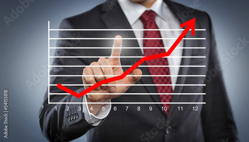 Photo: Man with Chart Man with Chart