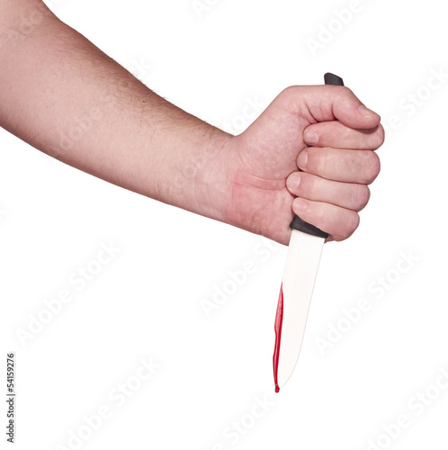 Photo: A knife smeared with blood. A knife smeared with blood.