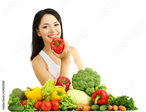 Photo: Girl with vegetables isolated on white Girl with vegetables isolated on white