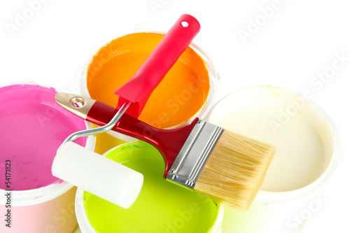 Photo: Set for painting: paint pots, brushes, paint-roller isolated Set for painting: paint pots, brushes, paint-roller isolated