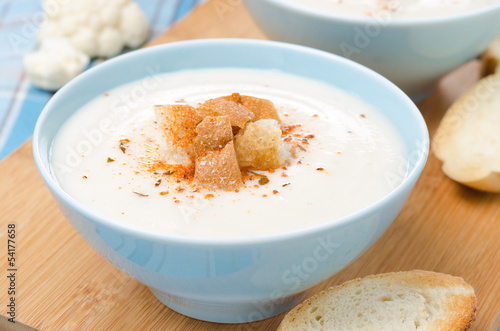 Photo: cold cauliflower soup with cottage cheese in a bowl cold cauliflower soup with cottage cheese in a bowl