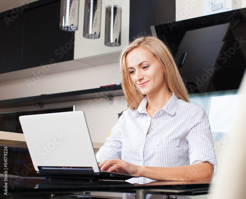 Photo: Woman with laptop Woman with laptop