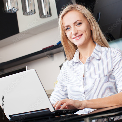 Photo: Woman with laptop Woman with laptop