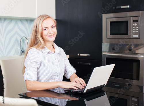 Photo: Woman with laptop Woman with laptop