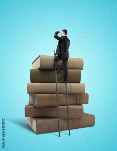 Photo: businessman and books businessman and books