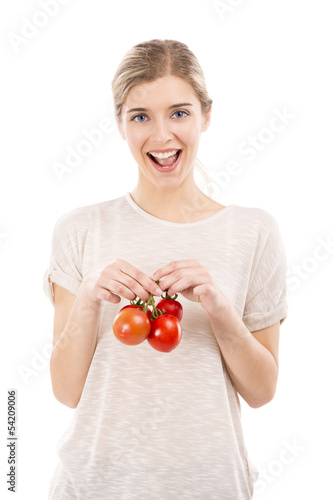 Photo: Beaitiful woman holding red tomatos Beaitiful woman holding red tomatos