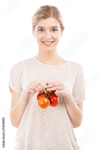Photo: Beaitiful woman holding red tomatos Beaitiful woman holding red tomatos