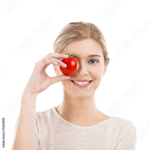 Photo: Beautiful woman holding a red chilli pepper Beautiful woman holding a red chilli pepper