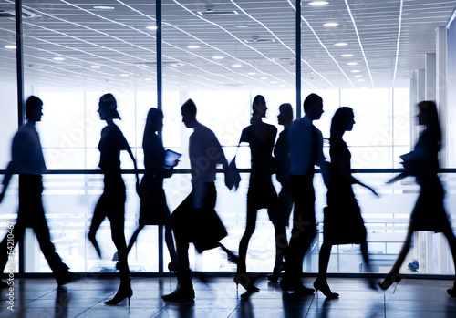 Photo: silhouettes of businesspeople silhouettes of businesspeople