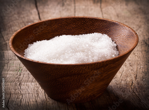 Photo: sugar on wooden table sugar on wooden table
