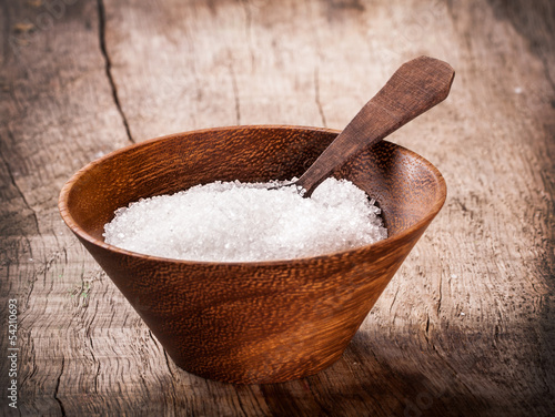 Photo: sugar on wooden table sugar on wooden table
