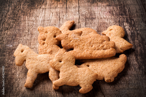 Photo: gingerbread on wooden table gingerbread on wooden table