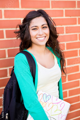 Photo: Beautiful young student in campus Beautiful young student in campus
