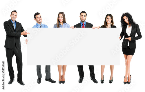 Photo: Happy people holding a white banner Happy people holding a white banner