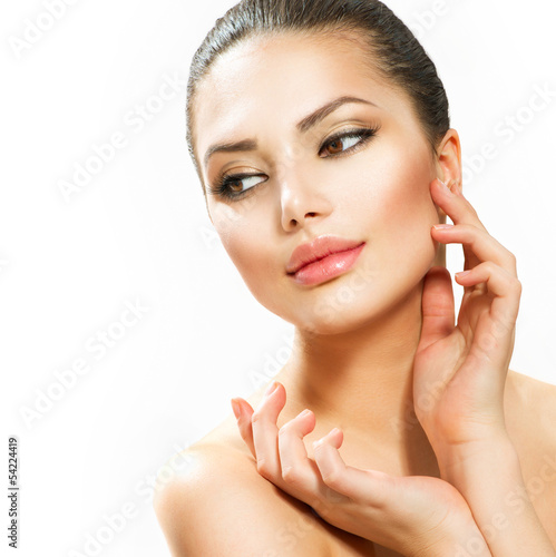 Photo: Beautiful Young Woman Touching Her Face Beautiful Young Woman Touching Her Face