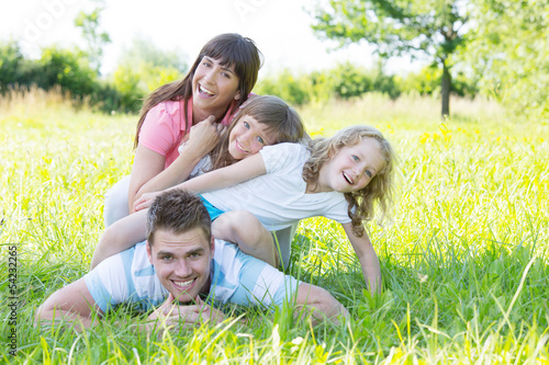 Photo: young family with 2 children young family with 2 children