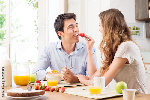 Photo: Couple having breakfast Couple having breakfast