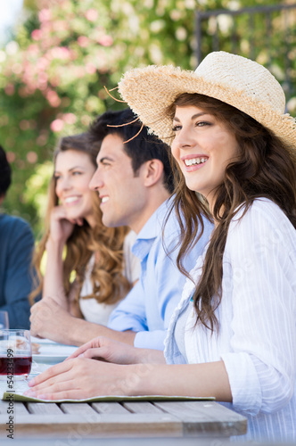 Photo: Young Woman Enjoying With Her Friends Young Woman Enjoying With Her Friends